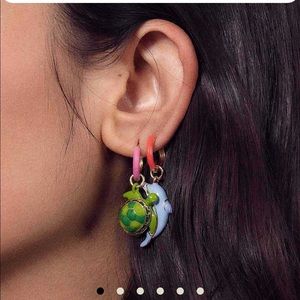Man repeller swimmers earrings